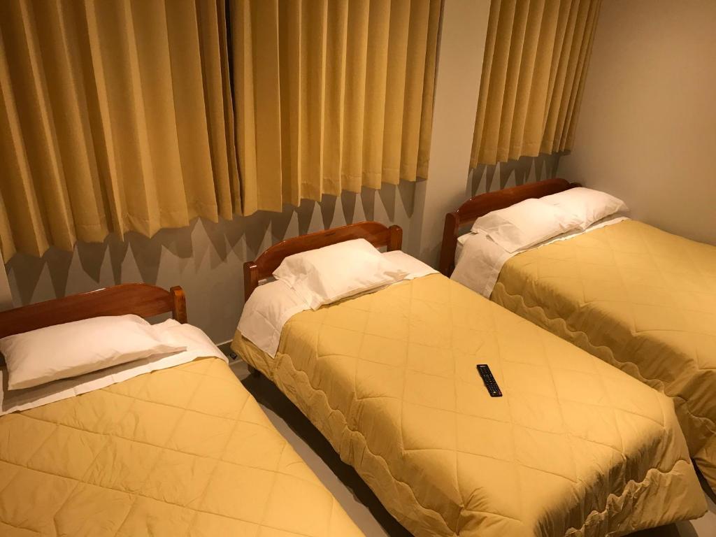 Postel nebo postele na pokoji v ubytování Edmoli Casa Hospedaje