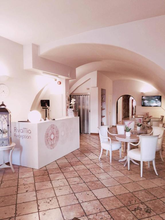 Kuchyň nebo kuchyňský kout v ubytování Hotel RivaMia