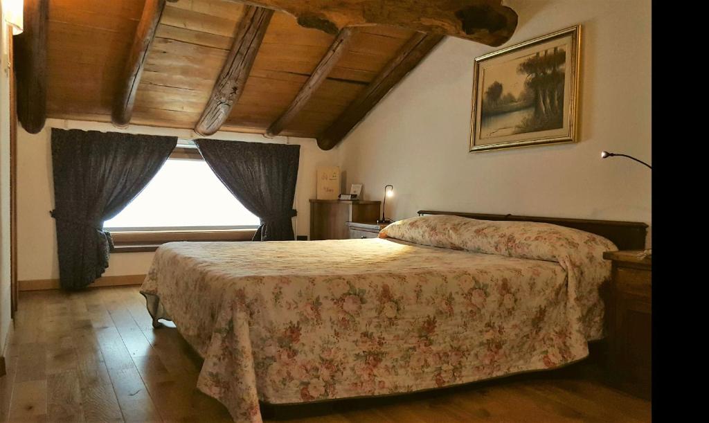Postel nebo postele na pokoji v ubytování La Brace