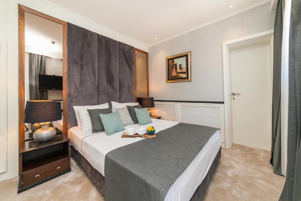 Postel nebo postele na pokoji v ubytování Hotel Casa del Mare - Amfora