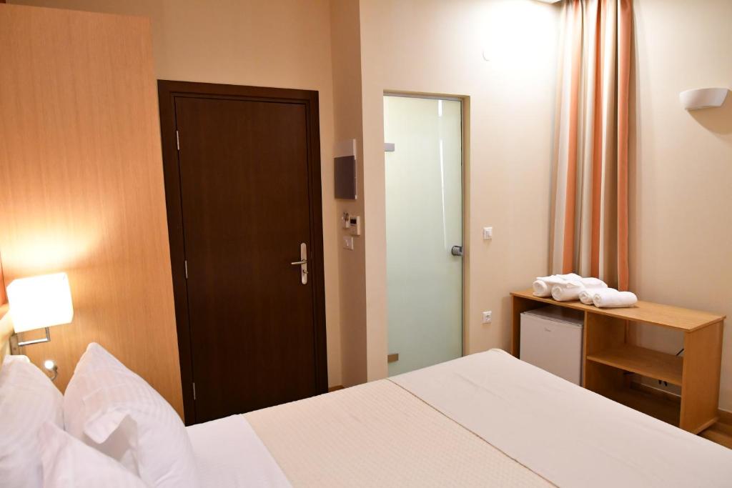 Postel nebo postele na pokoji v ubytování Onar Pension