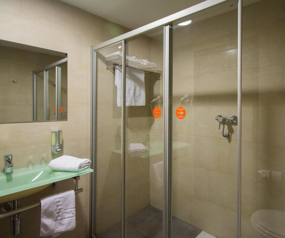 Koupelna v ubytování Hotel H2 Avila