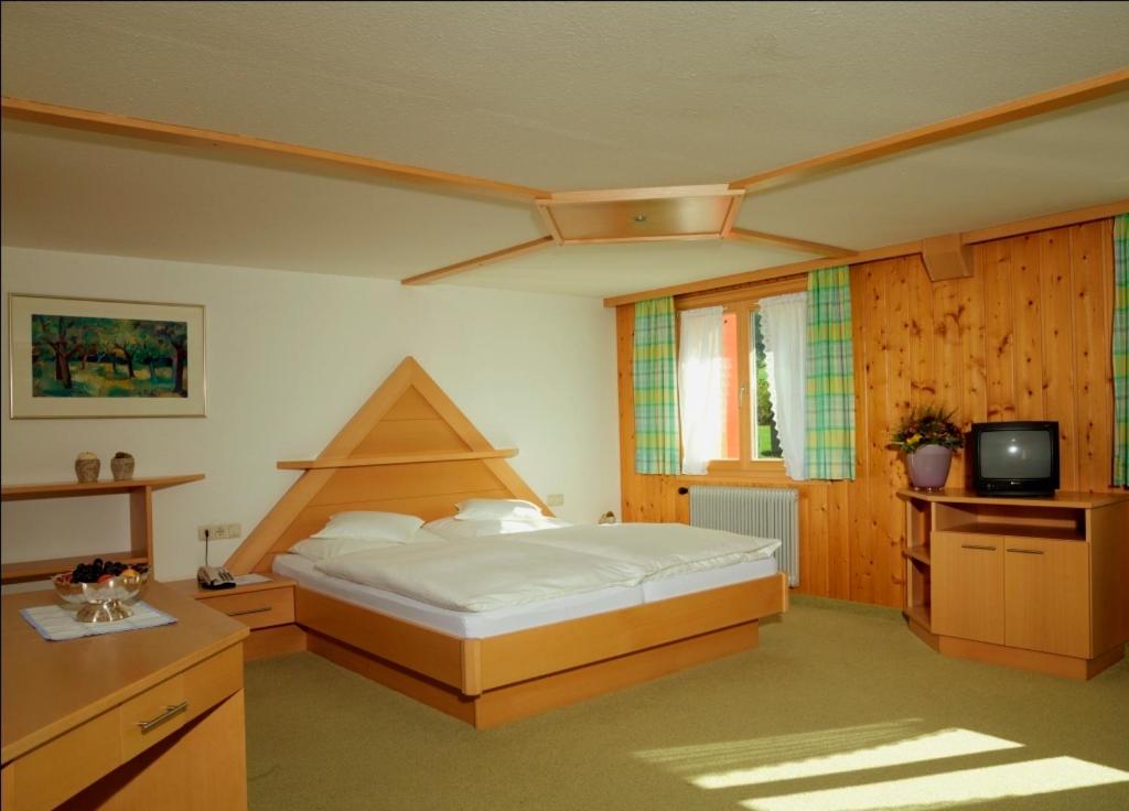 Postel nebo postele na pokoji v ubytování Gasthof Taube