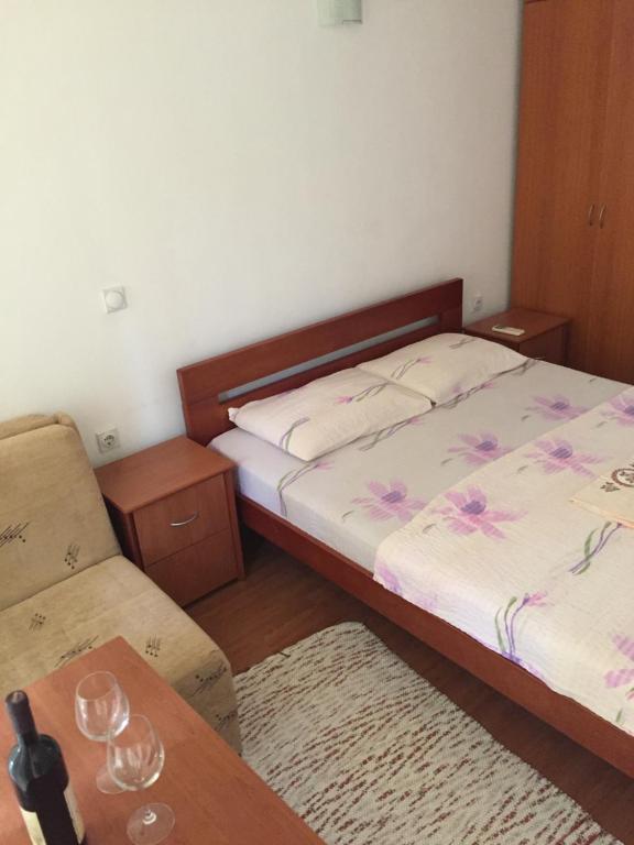 Postel nebo postele na pokoji v ubytování Tina Rooms