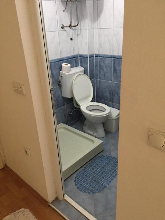 Koupelna v ubytování Tina Rooms