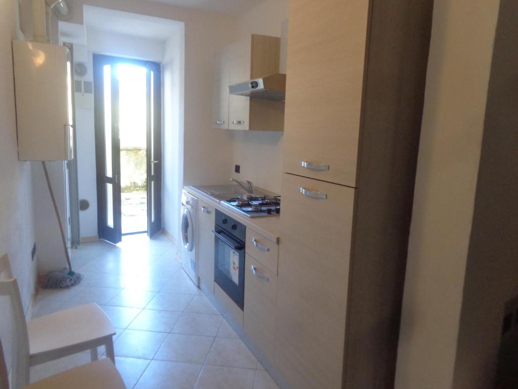 Kuchyň nebo kuchyňský kout v ubytování Casa Bergamo Mazzi