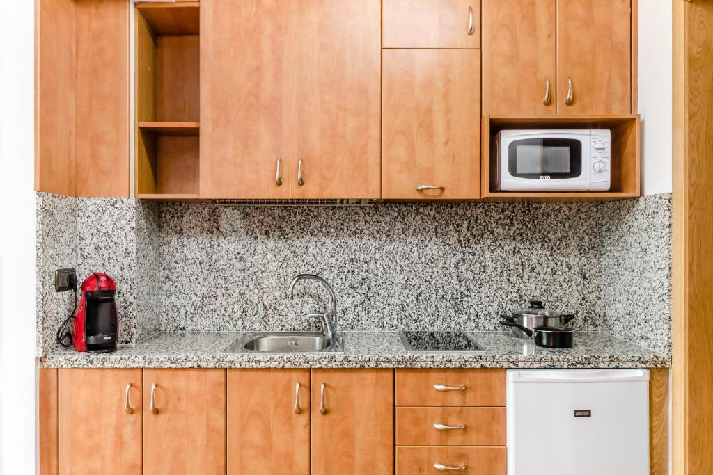 Kuchyň nebo kuchyňský kout v ubytování Apartamentos Prat de les Molleres