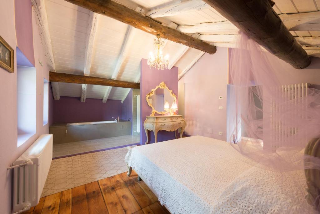 Postel nebo postele na pokoji v ubytování Quart de Lune - Boutique Stay