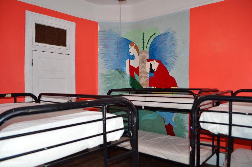 Postel nebo postele na pokoji v ubytování India House Hostel