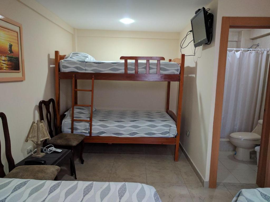 Postel nebo postele na pokoji v ubytování Hotel Mileto