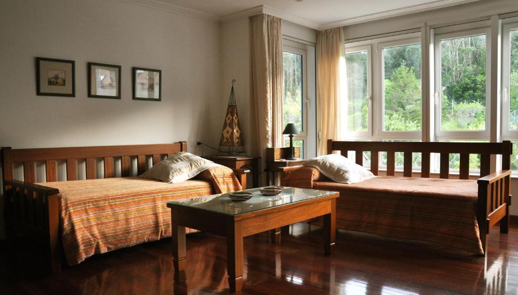 Postel nebo postele na pokoji v ubytování Casa Pilar