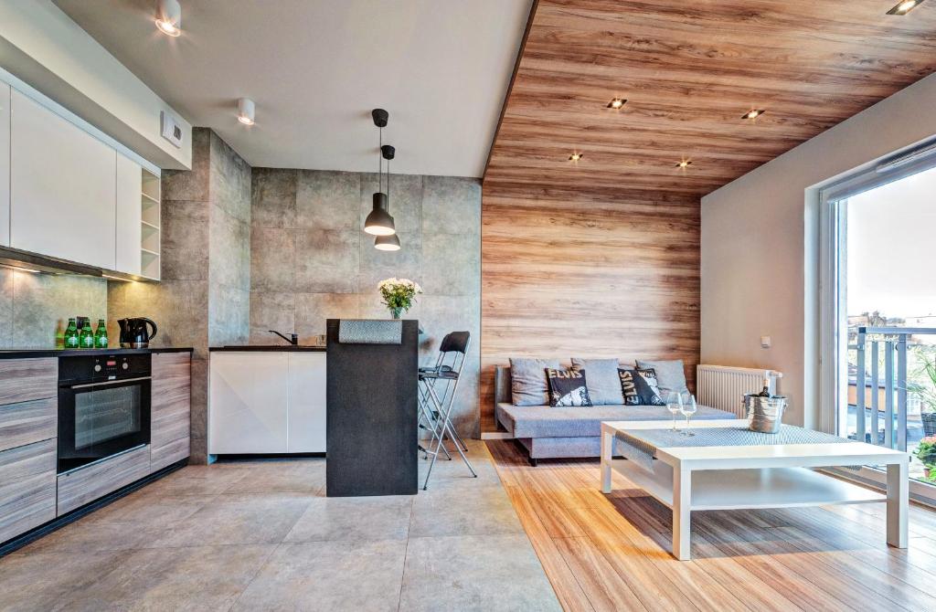 Kuchyň nebo kuchyňský kout v ubytování Apartamenty Homely Place Casa Verona - Stary Rynek - Parking