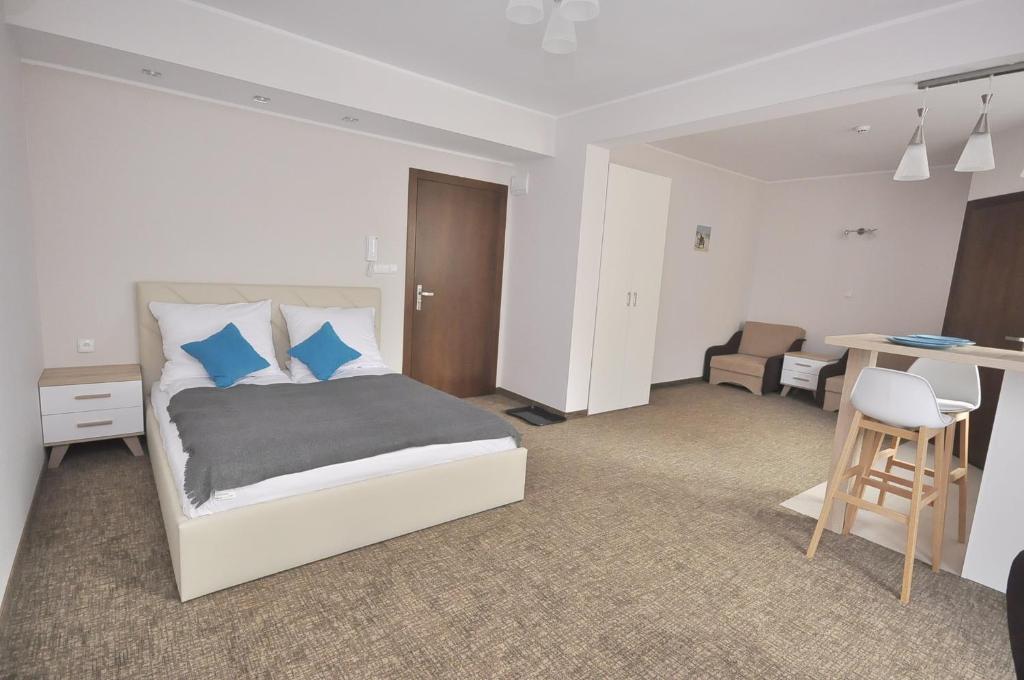 Posteľ alebo postele v izbe v ubytovaní Apartamenty Patria