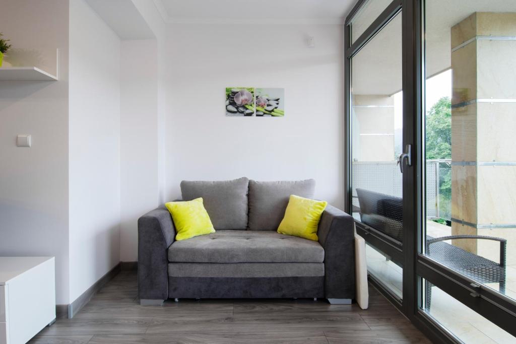 Posedenie v ubytovaní Tęczowe Wzgórze Apartament Oaza