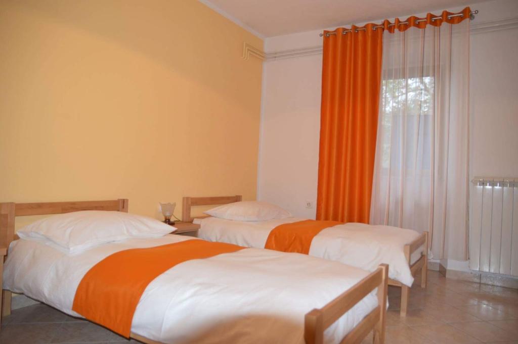 En eller flere senge i et værelse på Apartments Klabjan