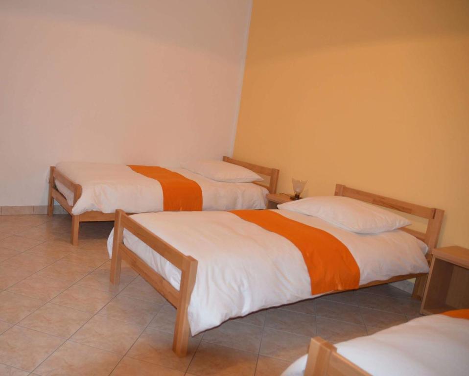 Postel nebo postele na pokoji v ubytování Apartments Klabjan
