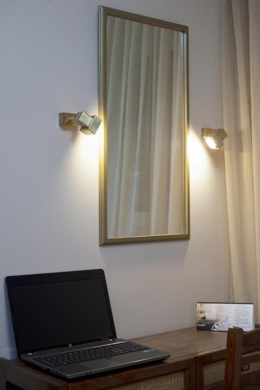 TV a/nebo společenská místnost v ubytování Olympos Hotel
