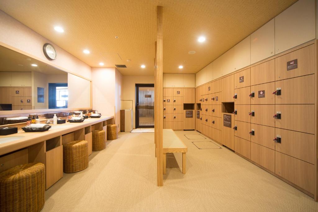 Kuchyň nebo kuchyňský kout v ubytování Dormy Inn Izumo