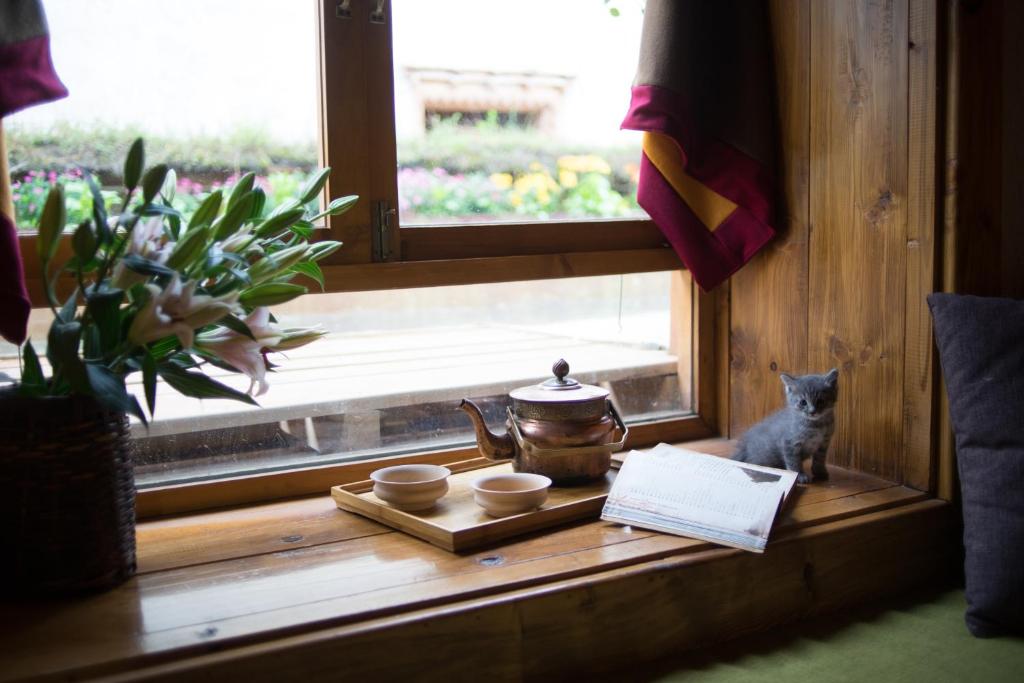 Posezení v ubytování Courtyard Shangri-la 藏舍小院