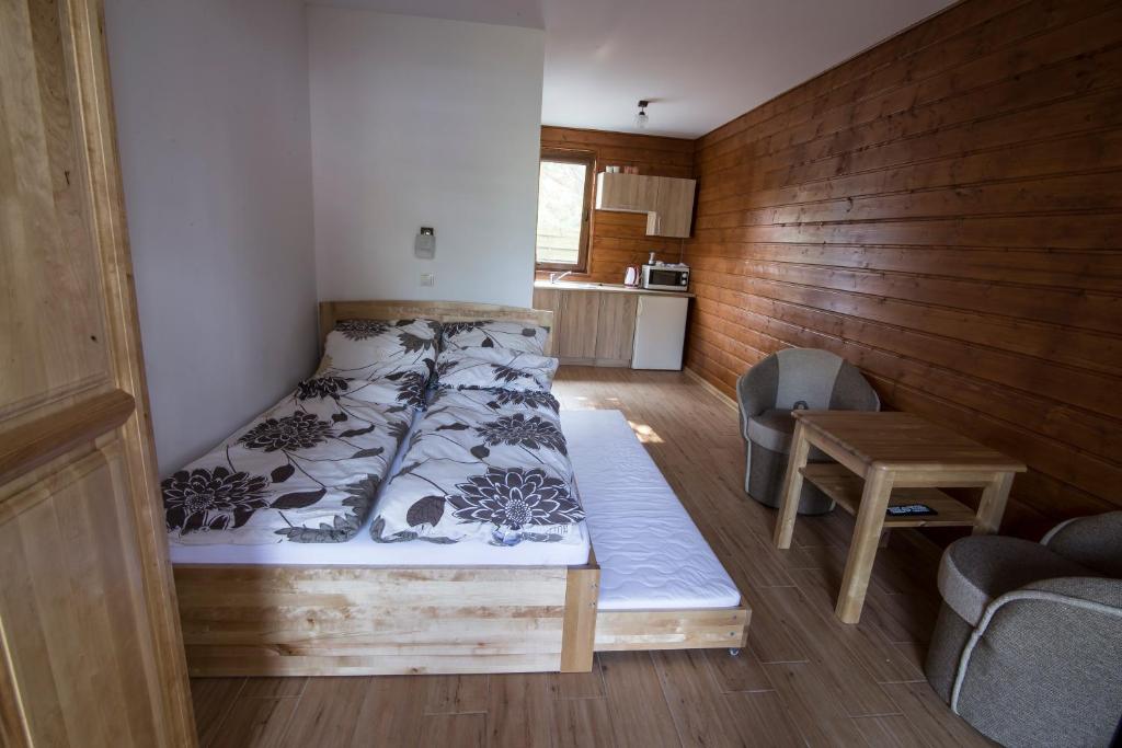 Postel nebo postele na pokoji v ubytování Domek Na Fali