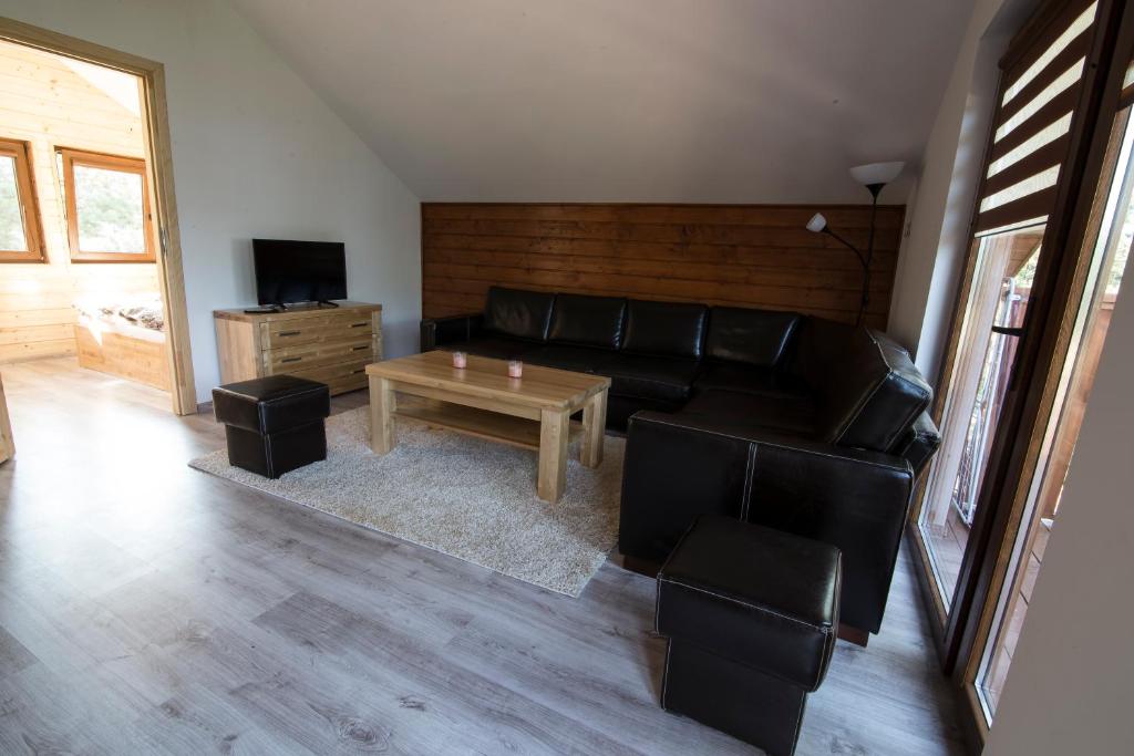 TV a/nebo společenská místnost v ubytování Domek Na Fali