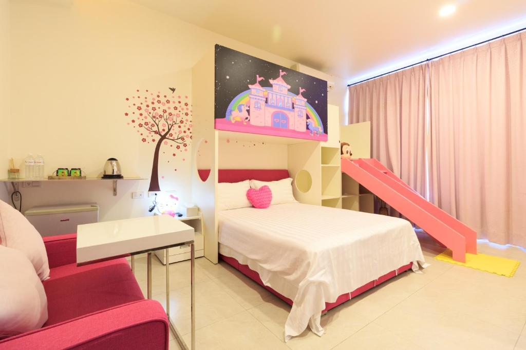 Postel nebo postele na pokoji v ubytování Flower B & B