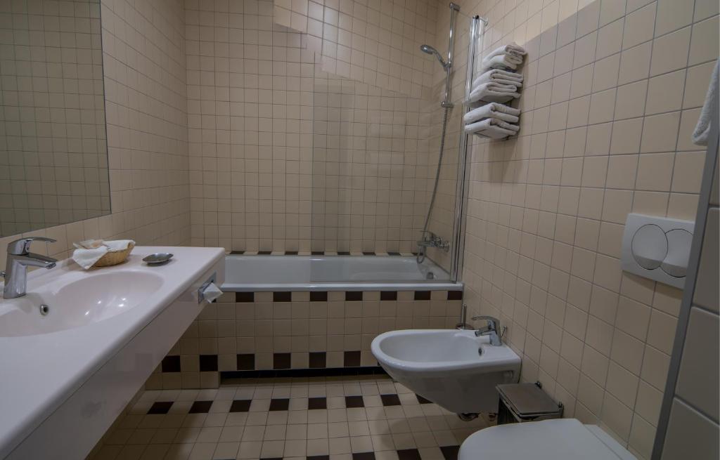 Koupelna v ubytování Perkuno Namai Park Hotel
