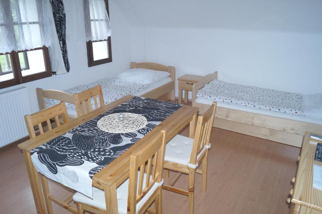 Postel nebo postele na pokoji v ubytování Chata Peklo