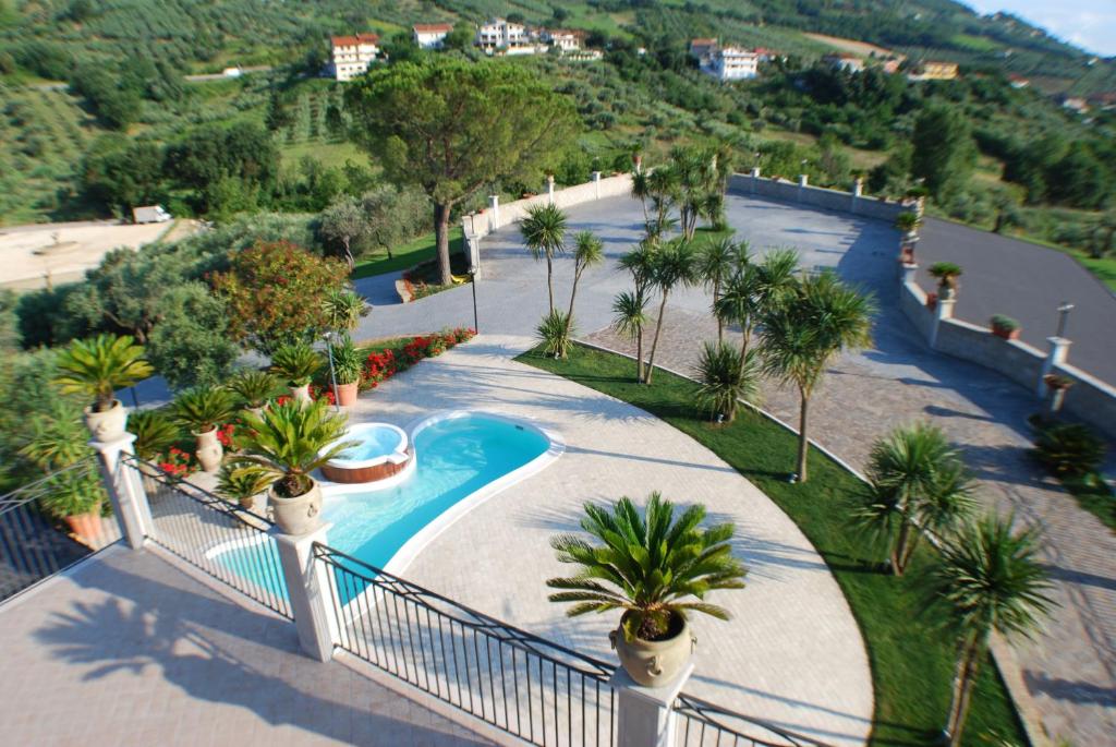 Bazén v ubytování Queen Hotel nebo v jeho okolí