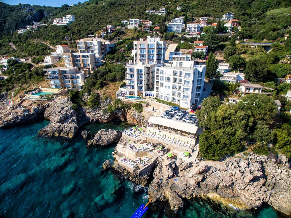 an aerial view of a resort on a rocky coast at Nautilus Apartments in Dobra Voda