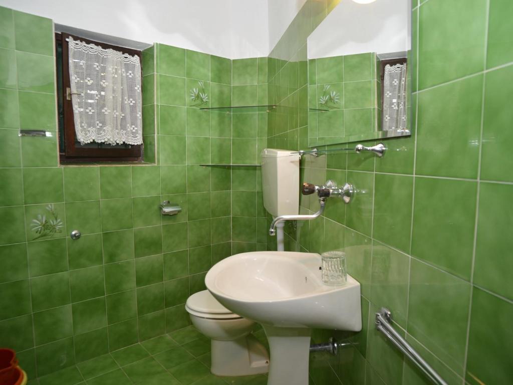 Kúpeľňa v ubytovaní Apartment Kukljica 5