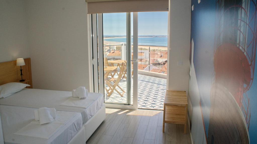 Postel nebo postele na pokoji v ubytování Topcity Hostel & Suites