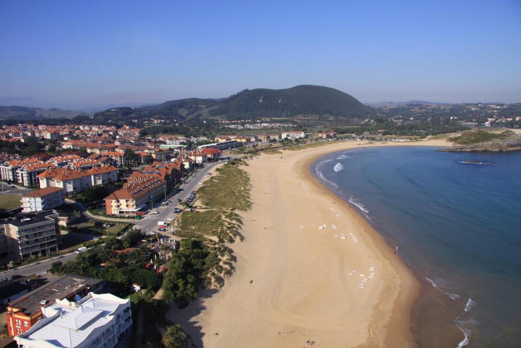 an aerial view of a beach and the ocean at Hotel las Dunas in Noja