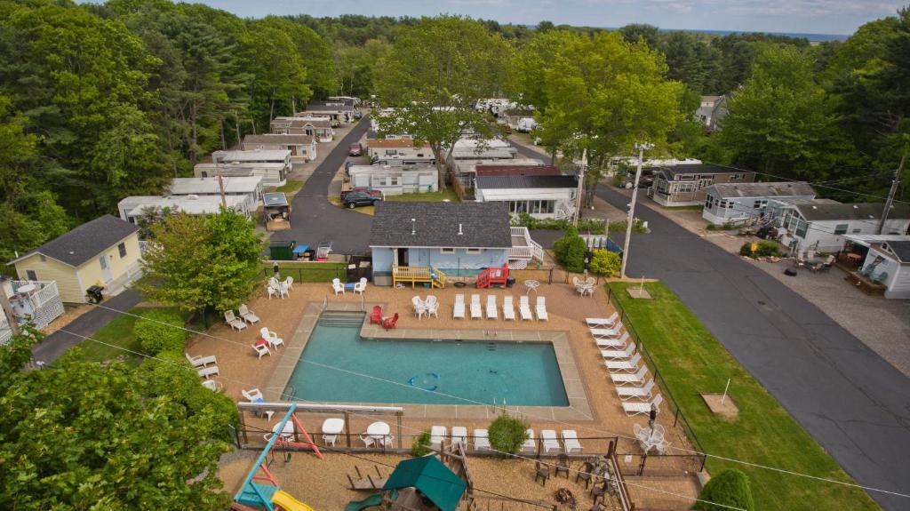 an aerial view of an rv park with a pool at Drake's Island Resort & Cottages in Wells
