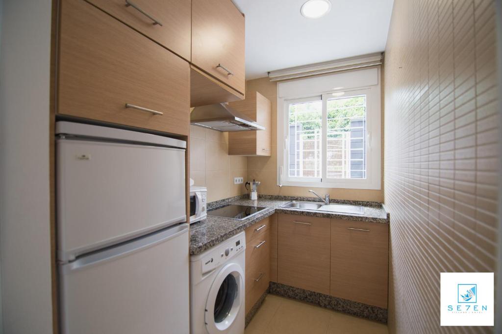 Kuchyňa alebo kuchynka v ubytovaní Apartamentos Seven Village