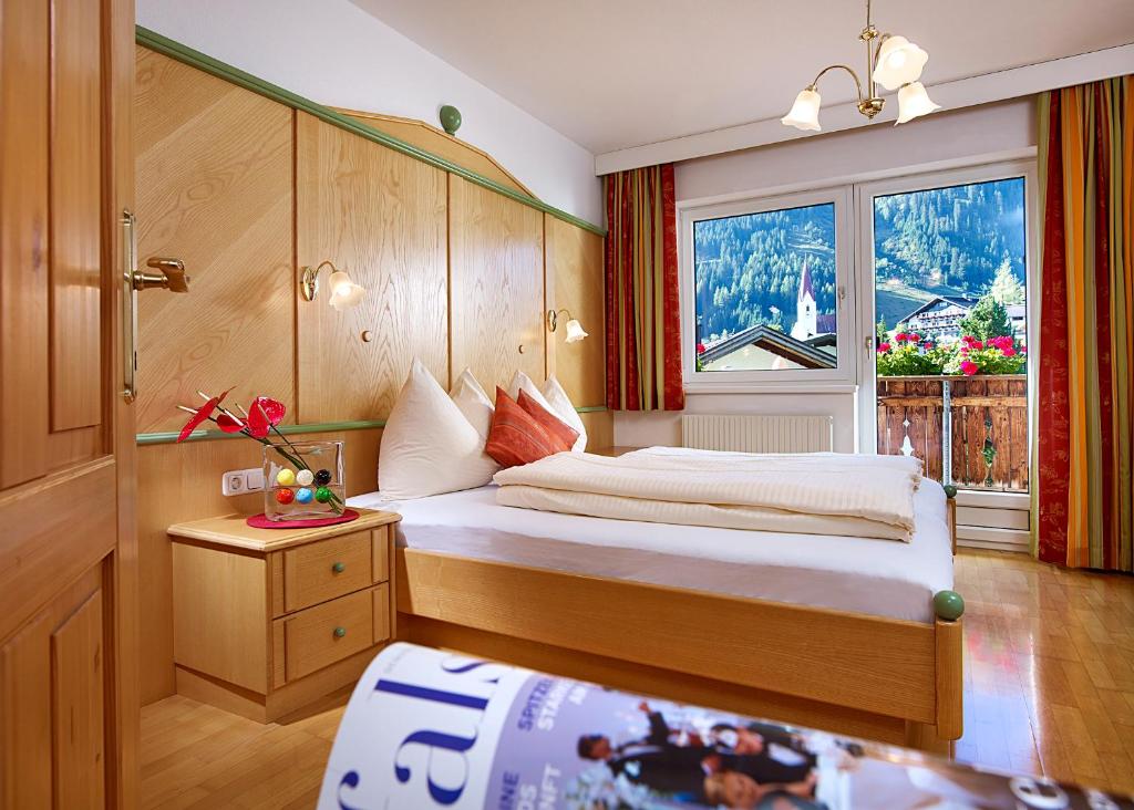 Ein Bett oder Betten in einem Zimmer der Unterkunft Villa Strolz