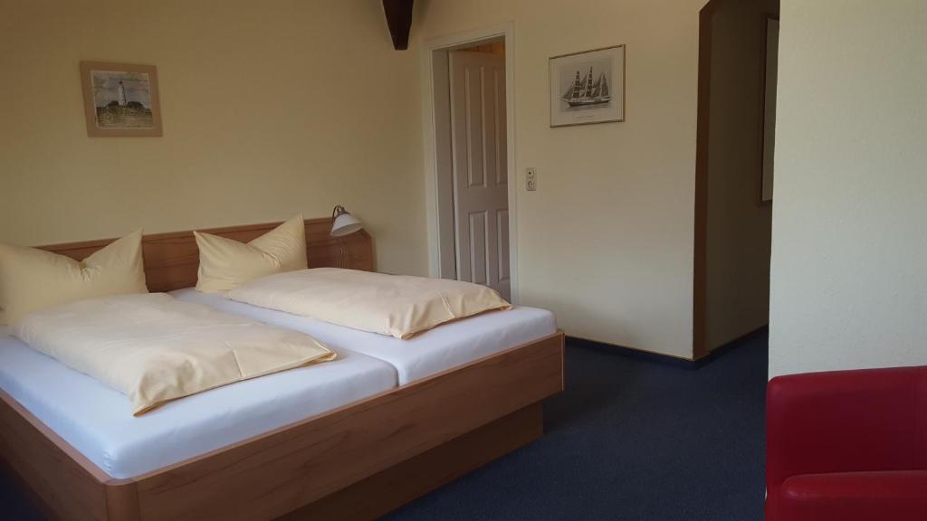 Postel nebo postele na pokoji v ubytování Hotel Schatthaus