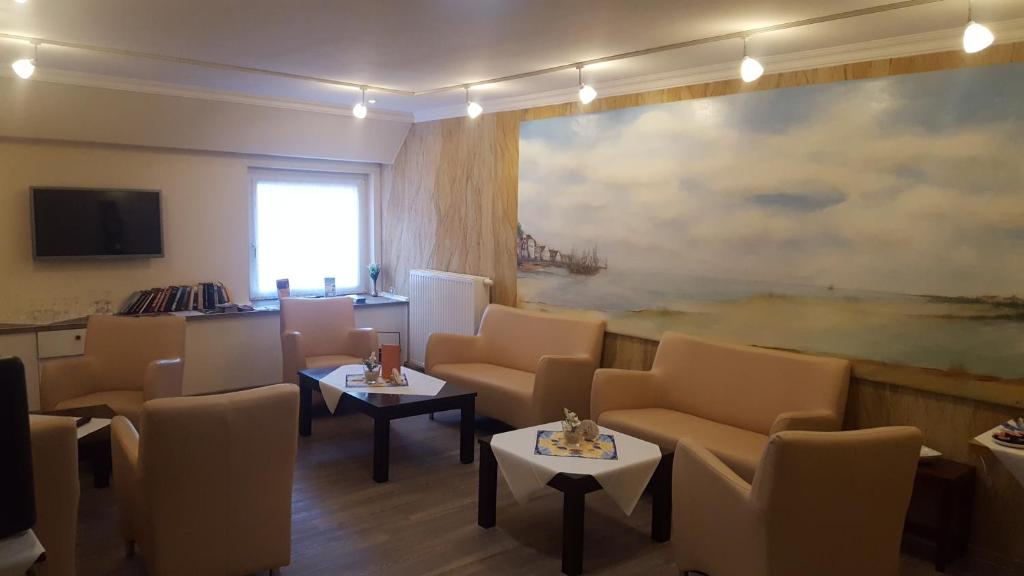 TV a/nebo společenská místnost v ubytování Hotel Schatthaus