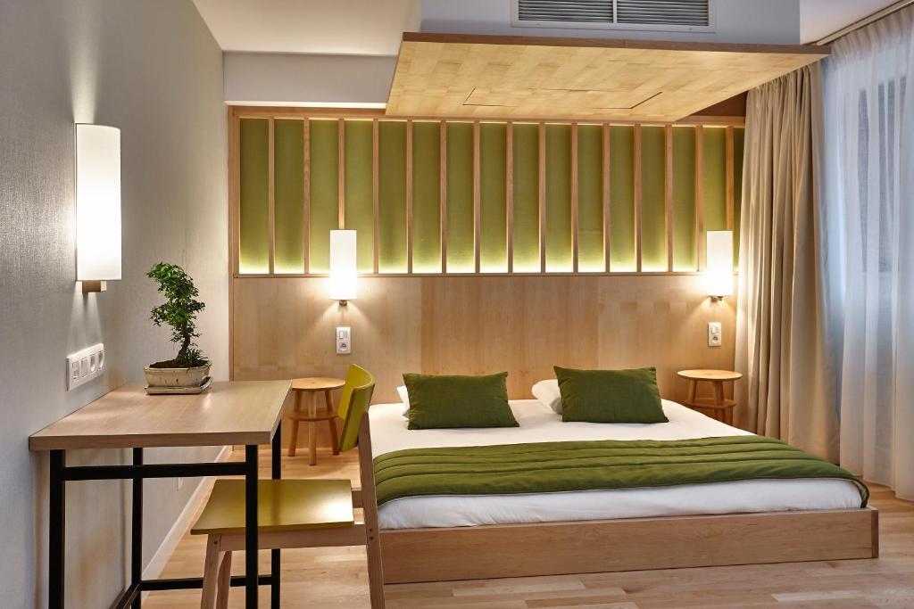 Postel nebo postele na pokoji v ubytování Yadoya Hotel