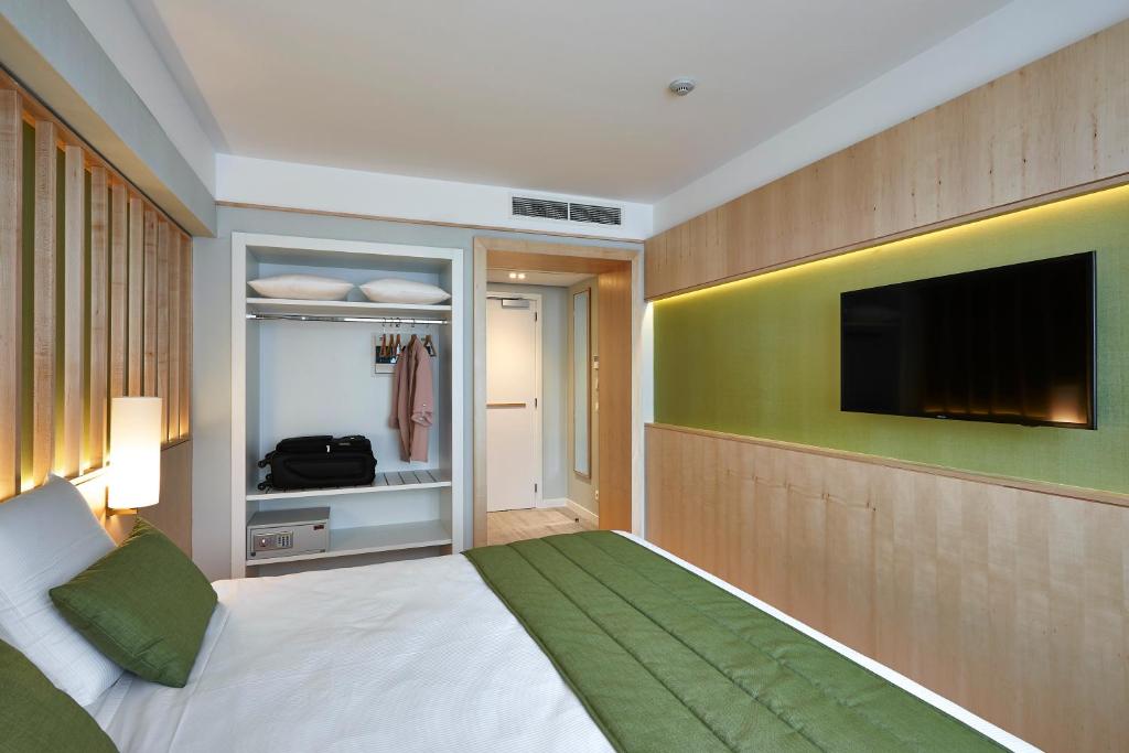 Postel nebo postele na pokoji v ubytování Yadoya Hotel