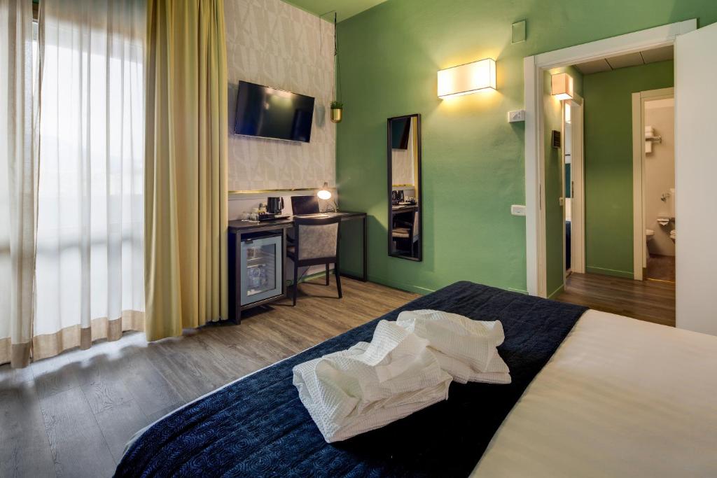 Postel nebo postele na pokoji v ubytování Best Western Plus CHC Florence