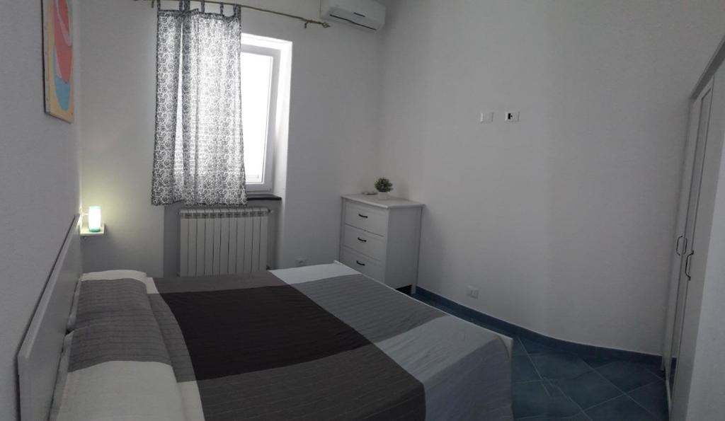 Llit o llits en una habitació de Citara mare