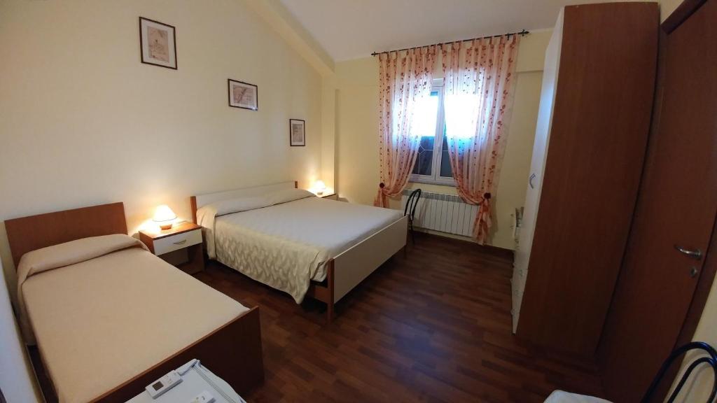Postel nebo postele na pokoji v ubytování Bruno B&B