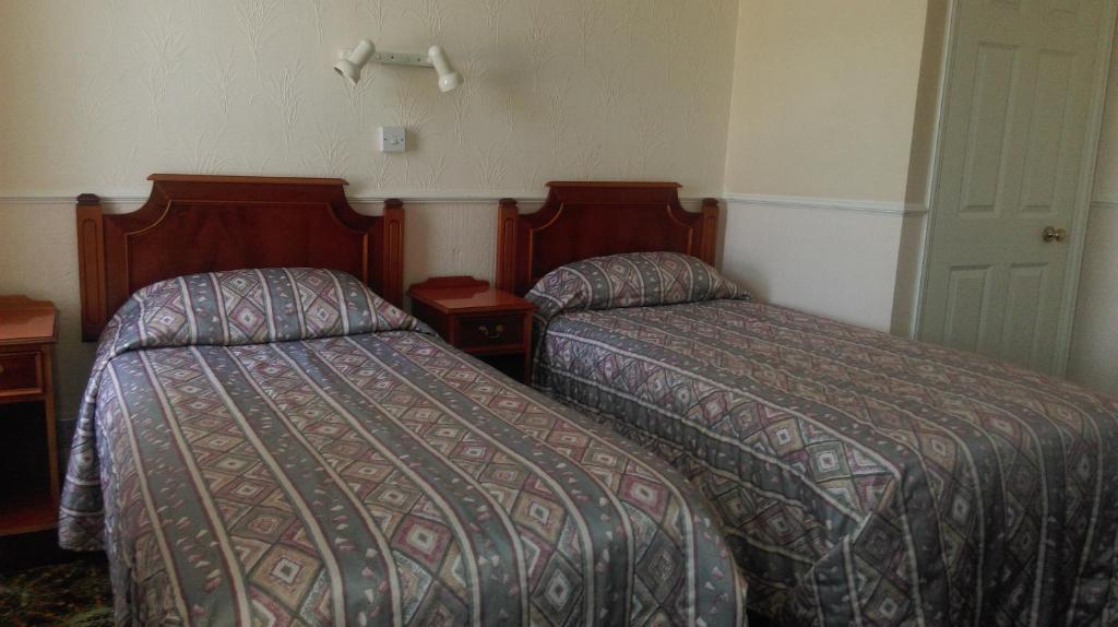 Postel nebo postele na pokoji v ubytování Havelock Guesthouse