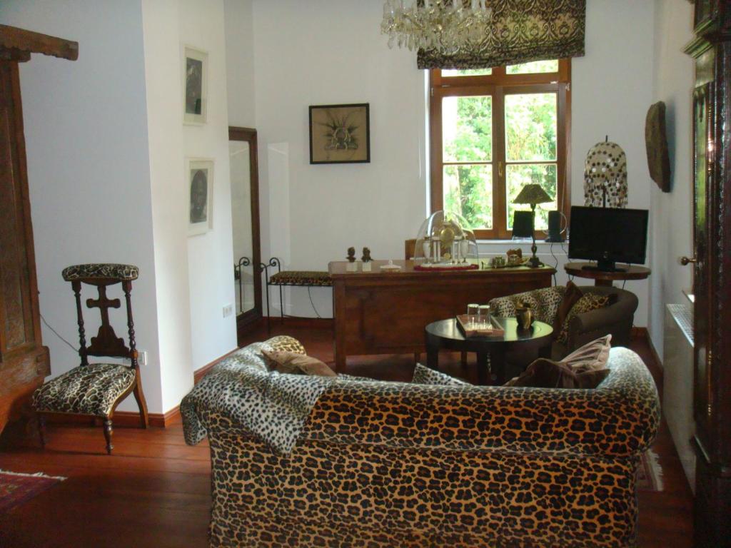 TV a/nebo společenská místnost v ubytování Residenz Villa Kult