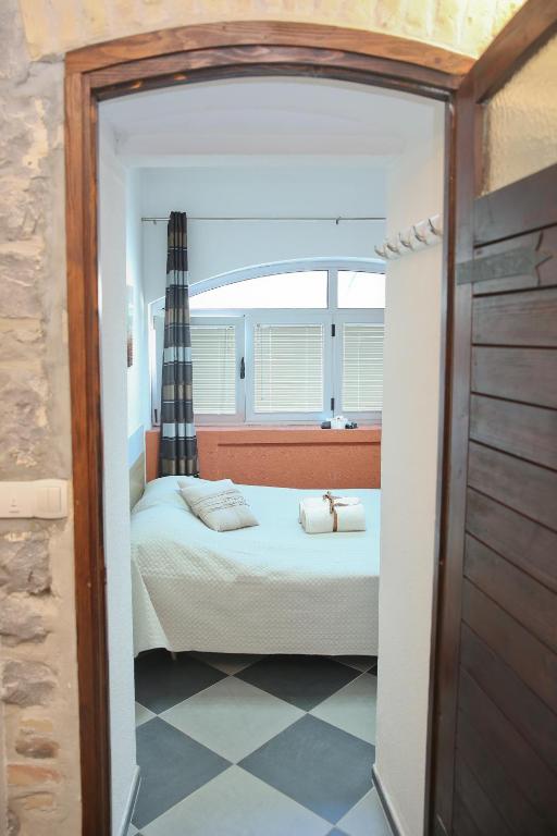 Una cama o camas en una habitación de Apartments Qualitas