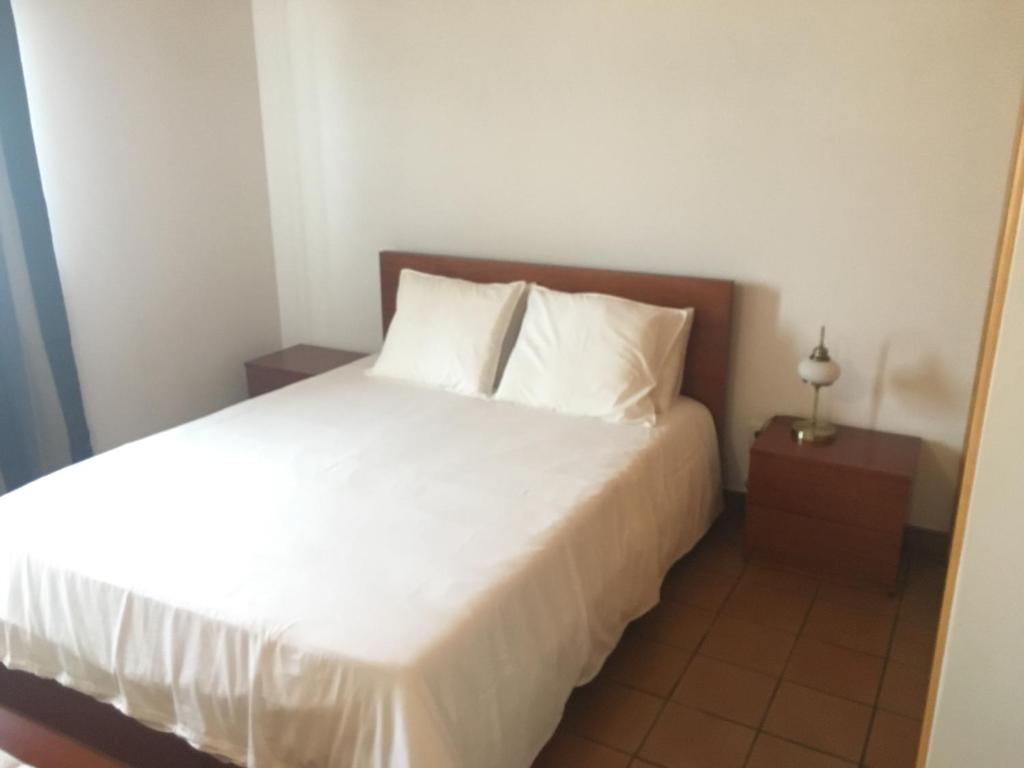 Postel nebo postele na pokoji v ubytování Casas do Verdelho