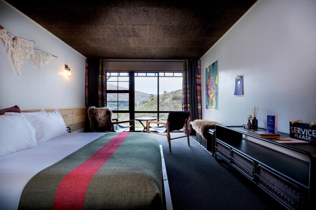 Postel nebo postele na pokoji v ubytování Sherwood Queenstown