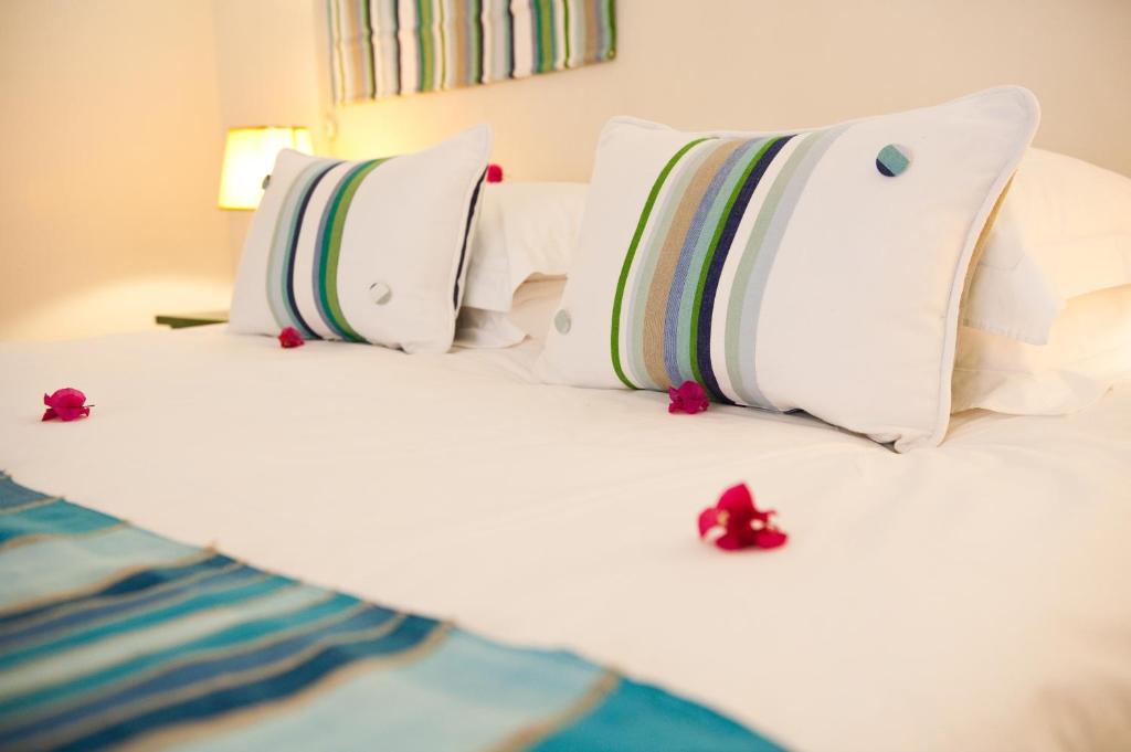 Een bed of bedden in een kamer bij Dar Maktoub