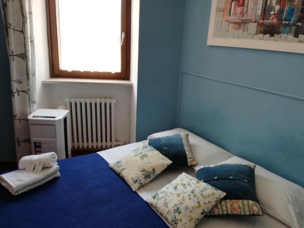 Posteľ alebo postele v izbe v ubytovaní B&B Casanova